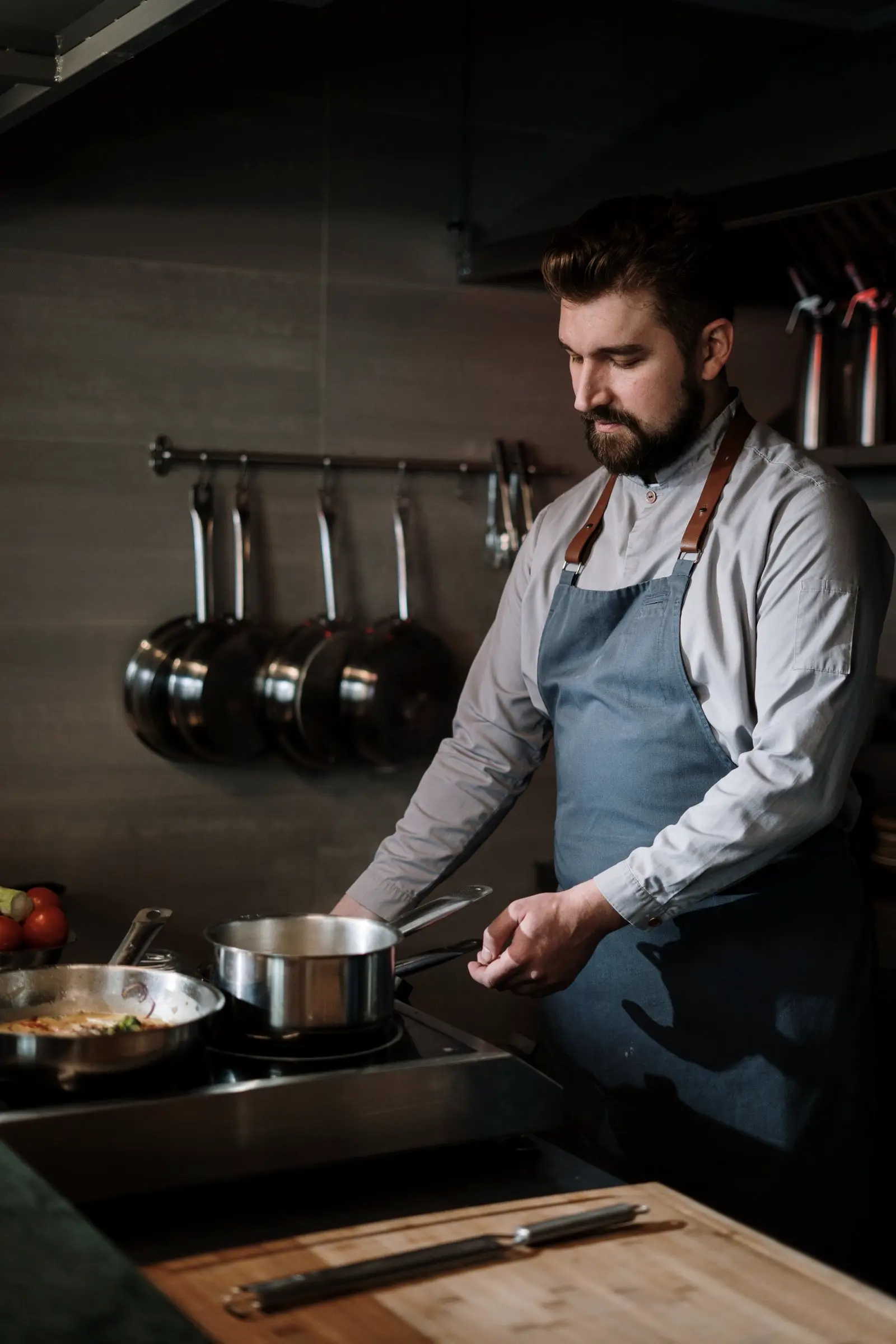 A man cooking in a home kitchen